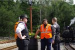 TRAIM CREW TALKING OVER PLANS